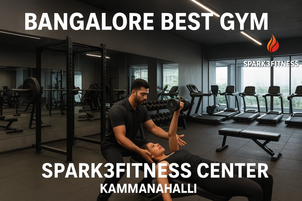Personal trainer assisting a client with dumbbell bench press at Spark3Fitness Center, Bangalore best gym in Kammanahalli.
