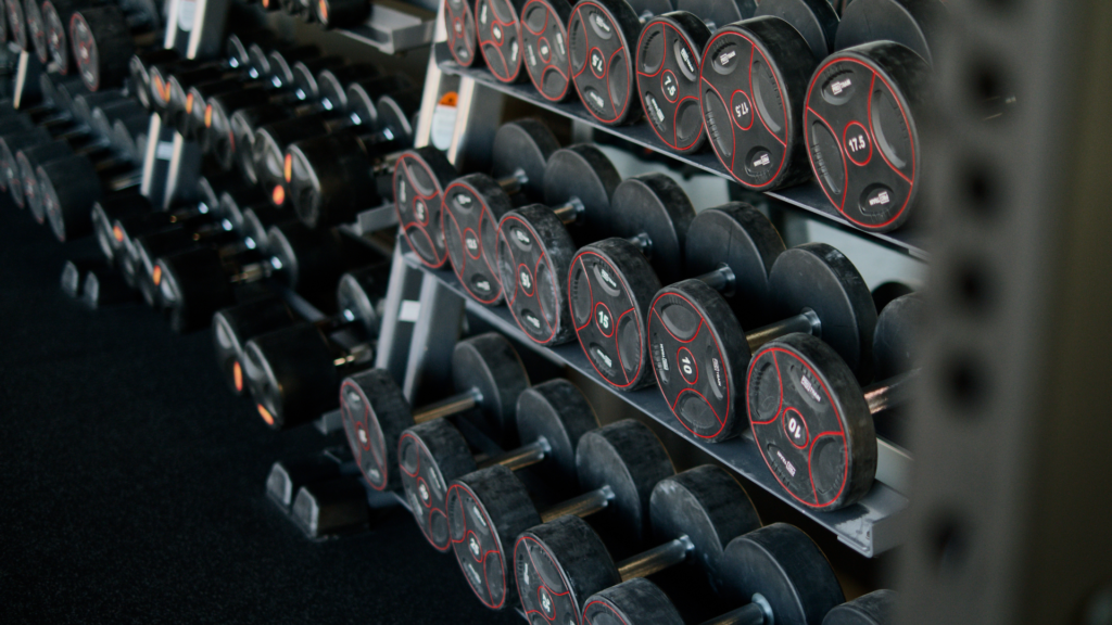 A wide-angle shot of the modern strength training area at Spark 3 Fitness, showing best gyms Bangalore with high-quality equipment and a clean, spacious workout environment in Kammanahalli, Bangalore.