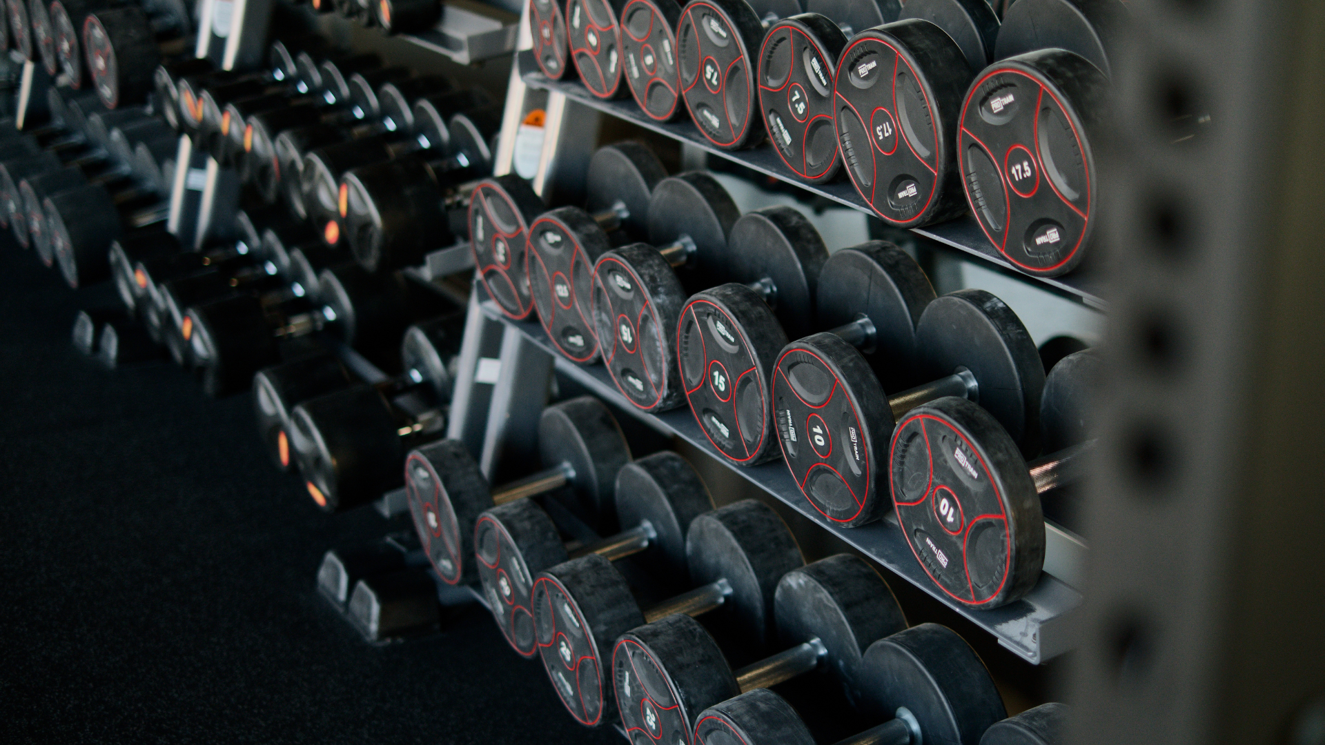 A wide-angle shot of the modern strength training area at Spark 3 Fitness, showing best gyms Bangalore with high-quality equipment and a clean, spacious workout environment in Kammanahalli, Bangalore.